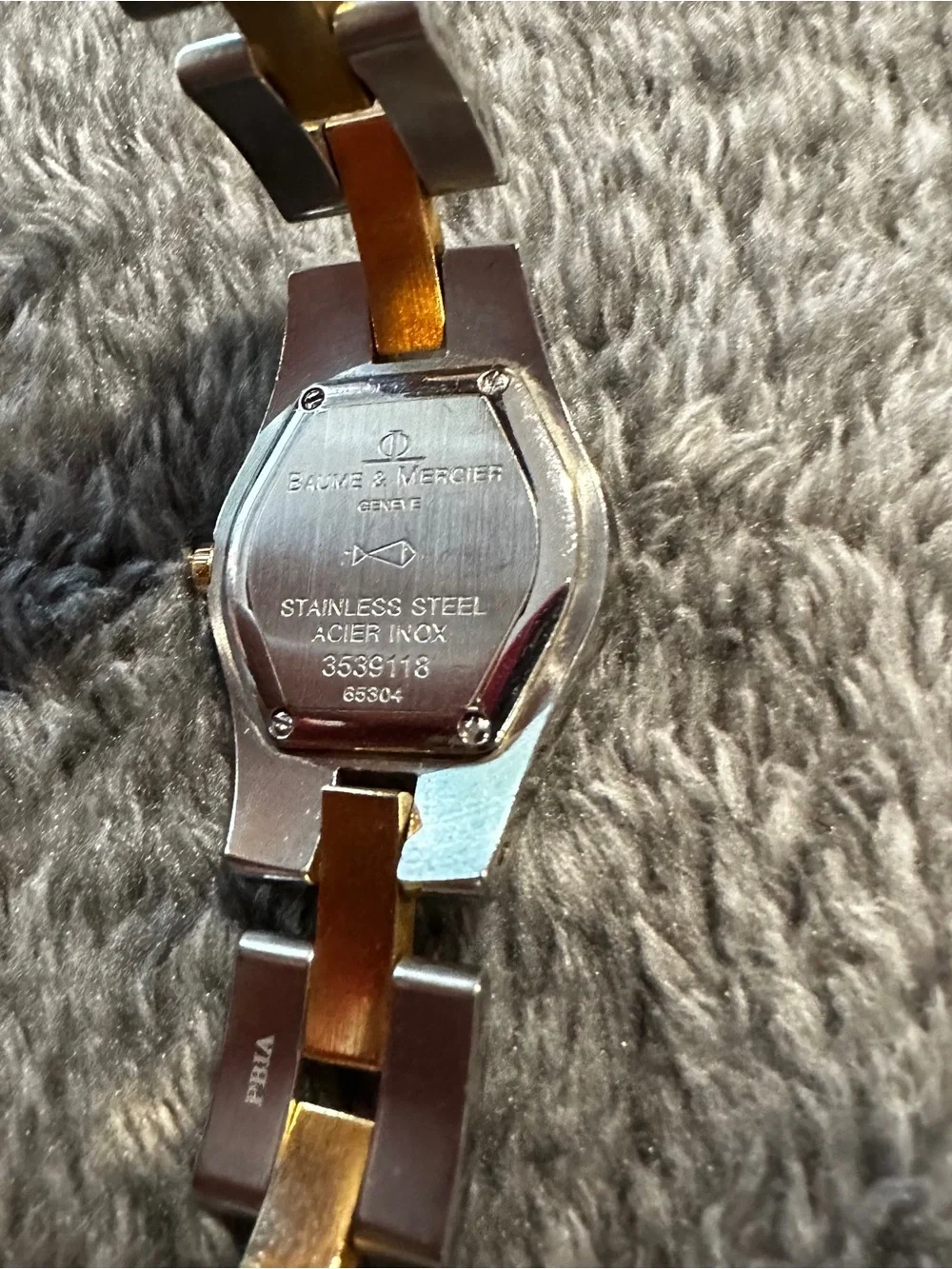 Baume & Mercier Linea 24mm two-toned 65304 watch w/ MOP face & diamond indices.